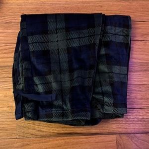 Blue and green striped pj pants with blue tie around the waist